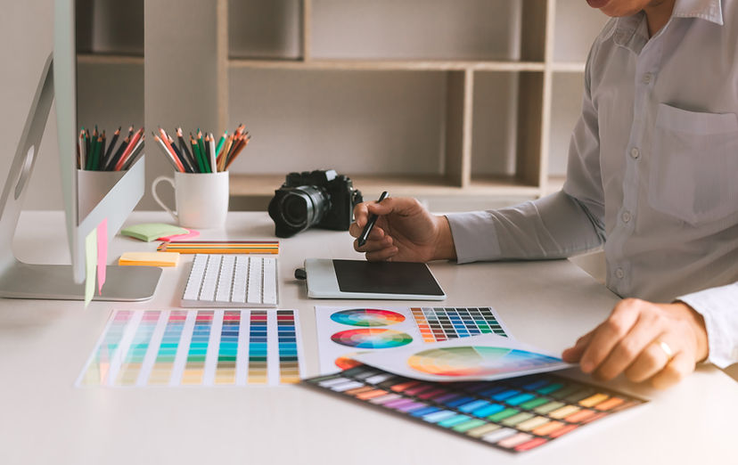 freelance-creative-designers-working-on-desk-using-2024-12-05-16-44-57-utc.jpg