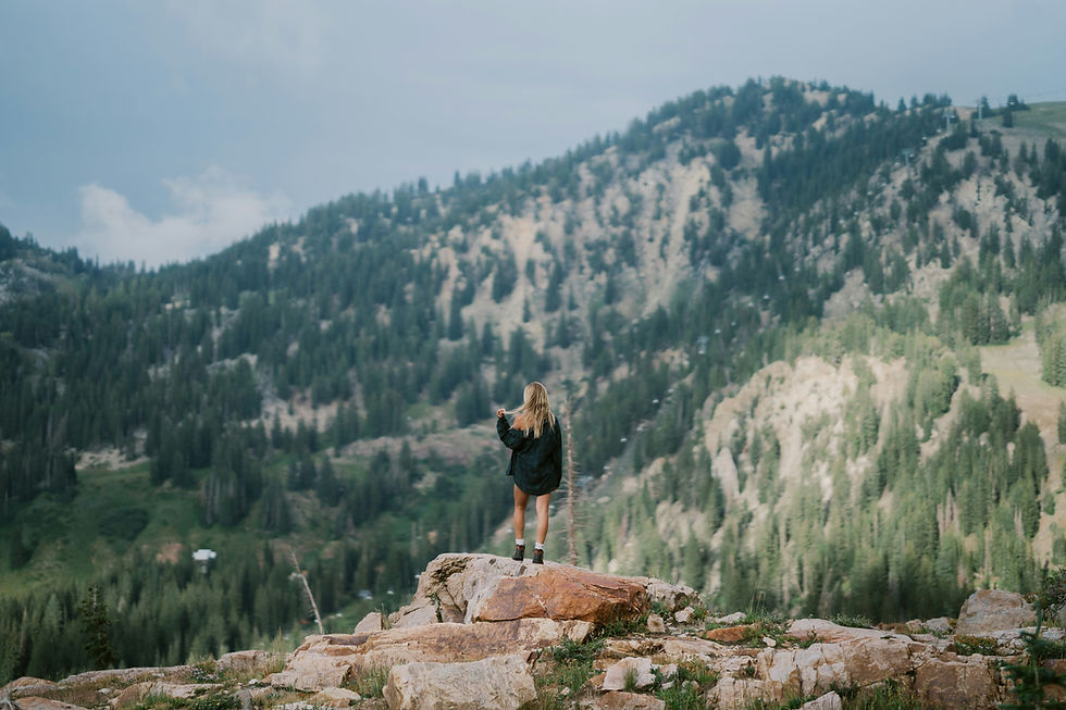 Girl hiking in mountains in Utah