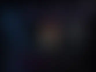 Inside view of a PC with colorful RGB lighting on RAM sticks and cooling fans. Dark interior creates a futuristic and tech-focused mood.