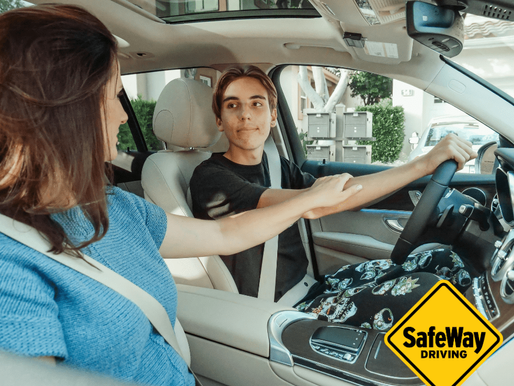 Mother teaching teen student how to drive