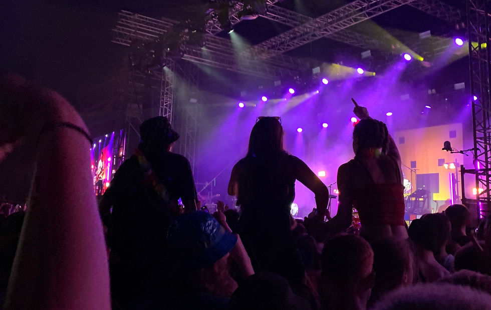 An image captured at the Neighbourhood Weekender 2023 of the wombats headlining the tent. 