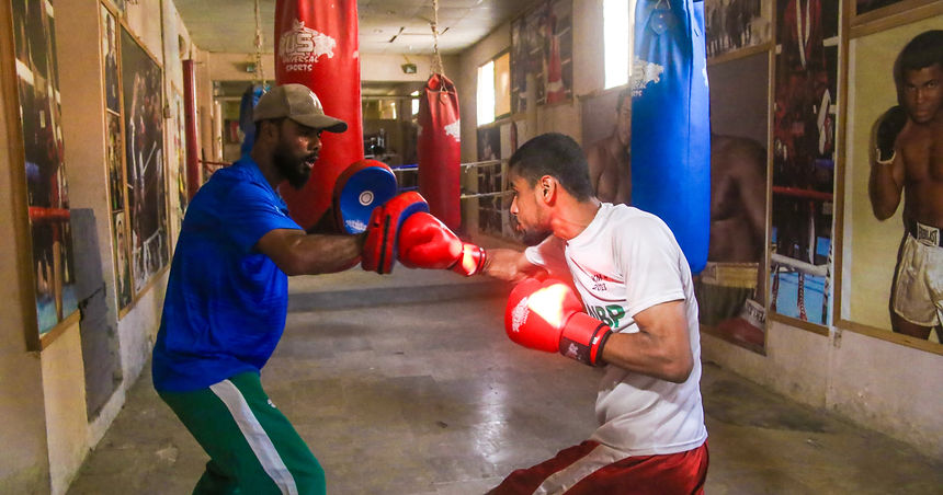 The boxers are fully immersed in their practice, showcasing remarkable passion despite having minimal resources. [Photo: Emaan]