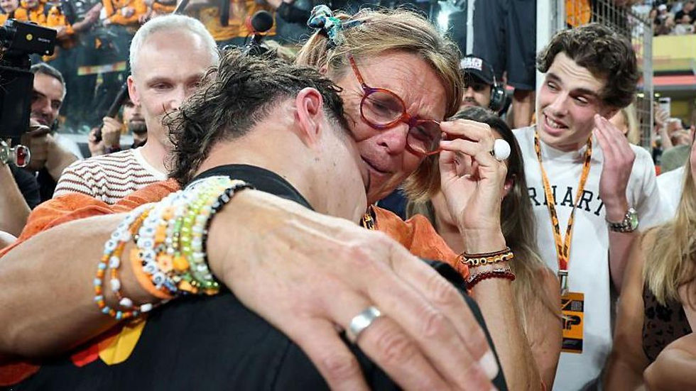 Lando Norris hugs mum, Cisca Wauman, after winning the Formula 1 Drivers' World Champion at the Abu Dhabi Grand Prix. Photo Credit: BBC Sport 