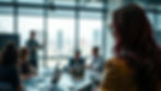 People in a bright boardroom engage in a discussion. A woman in focus with pink hair highlights watches. Cityscape visible through windows.
