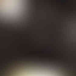 Packing with PG packer in cargo shorts, front view while sitting