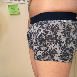 Packing with Mr X, side view in tight boxers