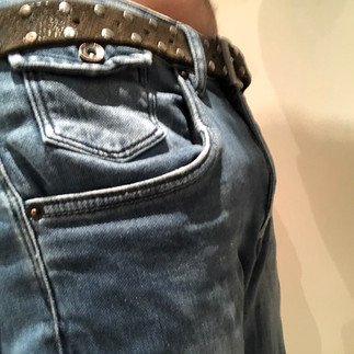 Packing with PG packer in jeans, side view