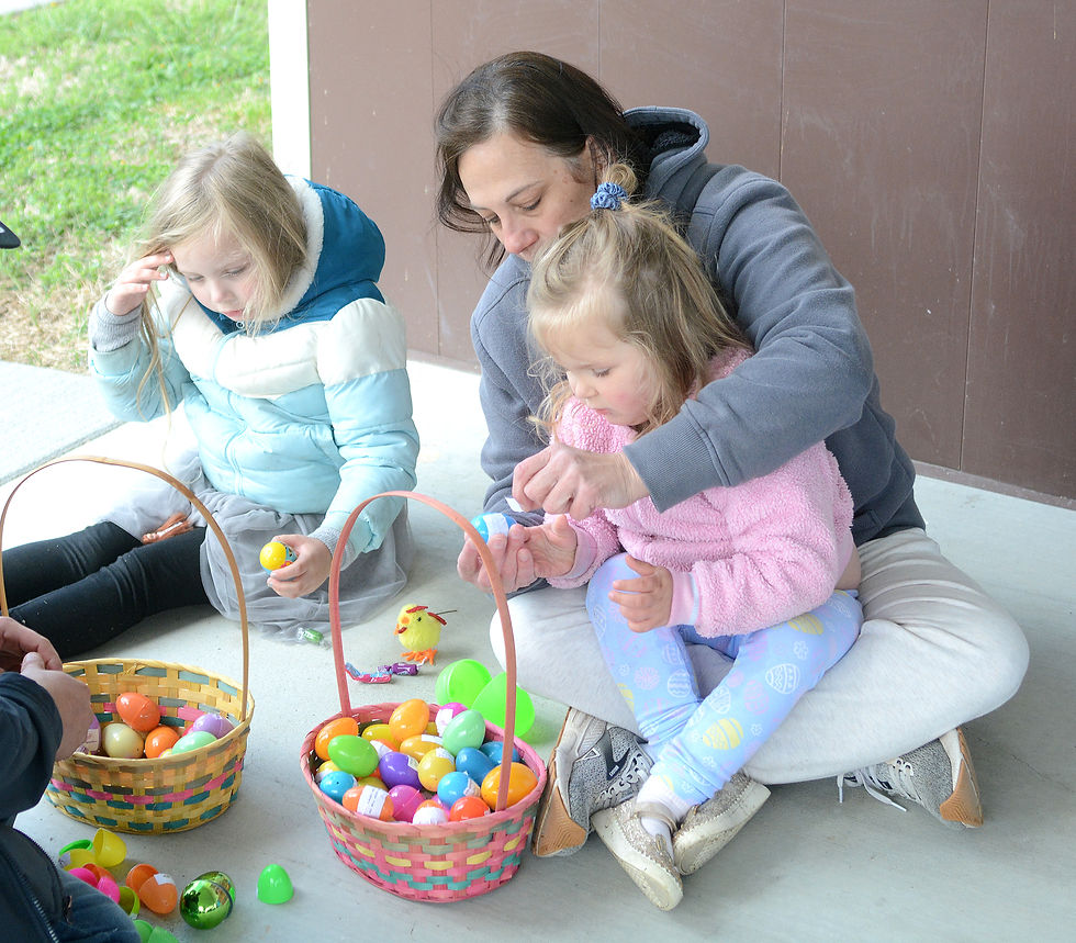 Families turn out for La Cygne egg hunt despite cool weather