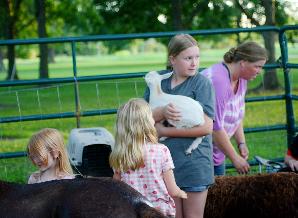 The petting zoo draws attention of many of the children who attended the Blast.