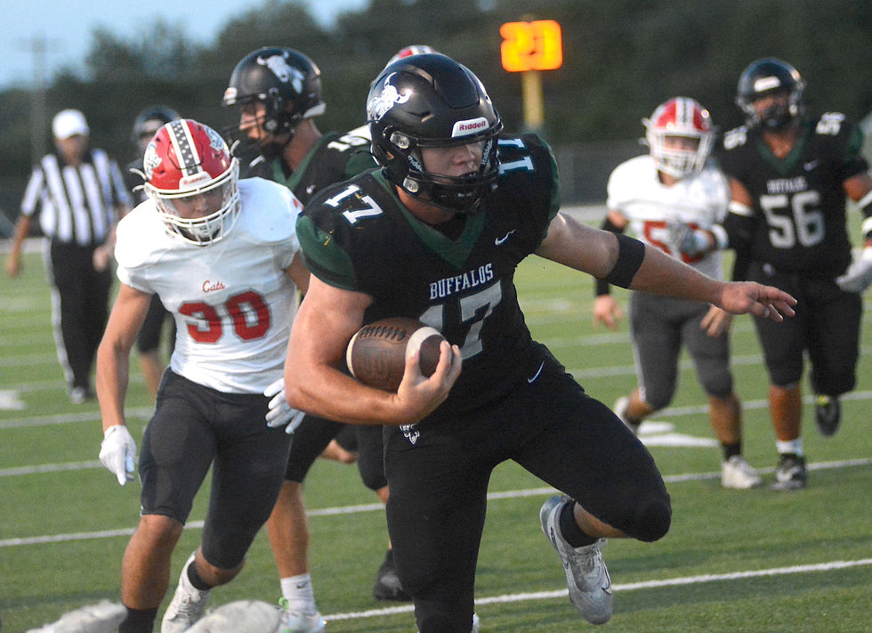 Buffalo running back Parker Schwarz clears the Wildcats' secondary on his way to a touchdown early in Friday's game against Burlington. Prairie View's all-time leading rusher added 184 rushing yards and three touchdowns to his record in the game. (Photos by Roger Sims / Linn County Journal)