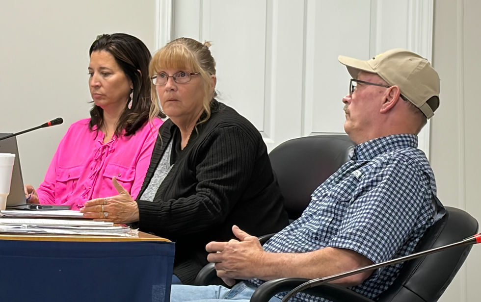 Pleasanton City Council member Sandy Haynes, center, explains her position on a vote at the city council meeting on Monday, May 4. City Attorney Jacklyn Paletta, left, resigned her post effective immediately after the council failed to vote on her reappointment by Mayor Mathew Young. (Photo by Roger Sims / Linn County Journal)
