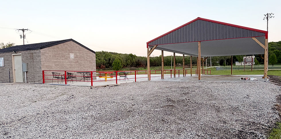 The new shelter at Mound City's splash park will provide much-needed shade for parents watching children play in the water. (Photo by Roger Sims / Linn County Journal)