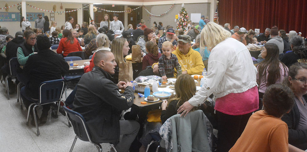 Parker-area residents and their families packed the multipurpose room at the Parker school.