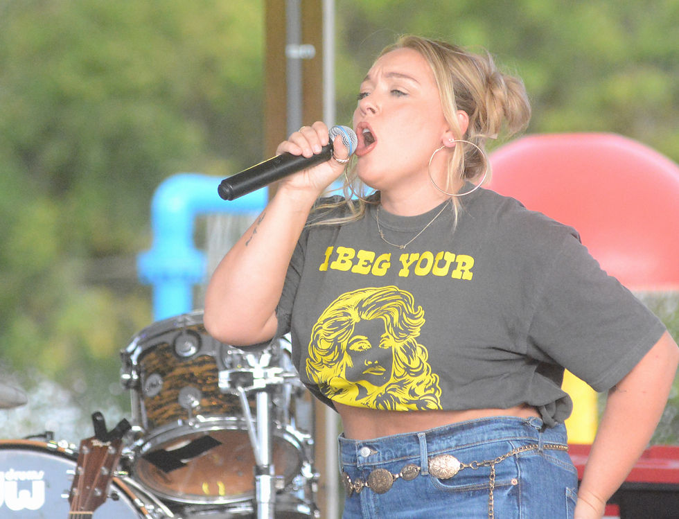 Erika Gilbert and Two Lane Highway will provide their blend of rock and country for Saturday evening's street dance.