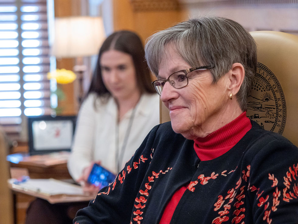 Gov. Laura Kelly answers a reporter’s questions during a Feb. 24, 2026, interview in her office at the Statehouse in Topeka. (Photo by Sherman Smith/Kansas Reflector)