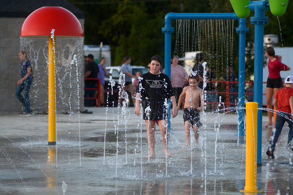 The weather may have been cool, but that didn't stop kids from taking advantage of the splash park.