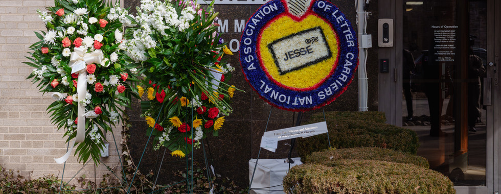 Floral arrangements in honor of Rev. Jesse Jackson outside Rainbow PUSH Coalition | Miguel Guerrero