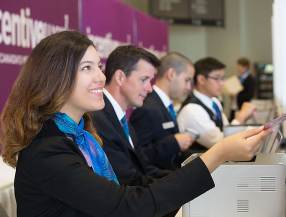 registration-desk-staff-photo_CEE858FF-87CE-4C69-8BA535D08DF25011_275df52c-a27a-4cae-9c564