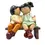Miniatura: Figura decorativa de niños sentados en banco con paloma, en resina, estilo tierno y romántico.