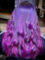 Alternative wavy purple and pink gradient hair