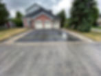 Newly paved driveway drying.