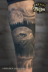 red tailed hawk tattoo with forest silhouette and full moon landscape morph black and grey by Chelsea Louviere
