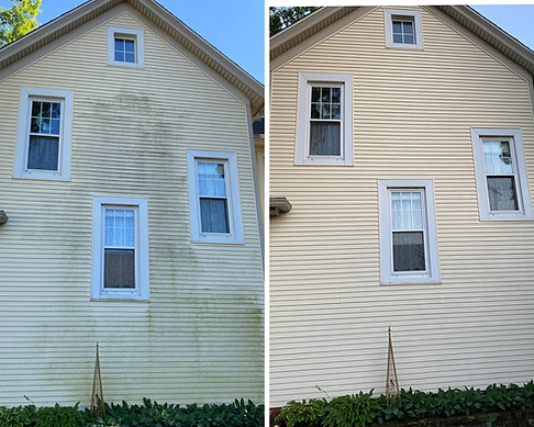 Residential siding cleaned with professional pressure washing – before and after comparison