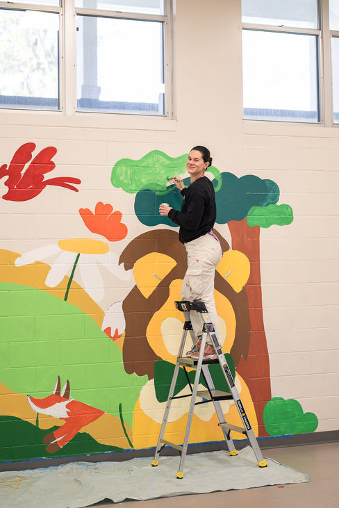 Bright and colorful mural at Littlewood Elementary School by Gainesville portrait photographer CWP Photography