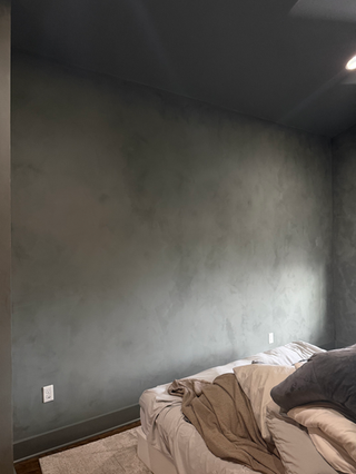 Hand-applied brown limewash living room with warm textured walls by Limewash Painting LLC in Middle Tennessee.