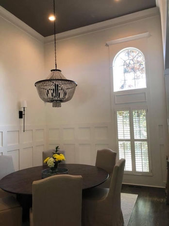 Freshly painted dining room with smooth walls, clean trim, and a professional interior paint finish