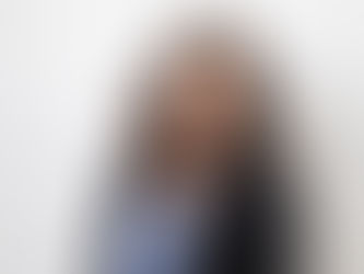 A professional headshot of a lawyer