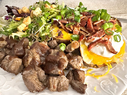 Tiny Mighty mixed into a bagged salad as a side for steak bites and loaded baked potatoes.