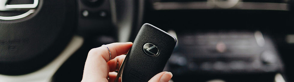 Satisfied customer holding replacement car key in Slough