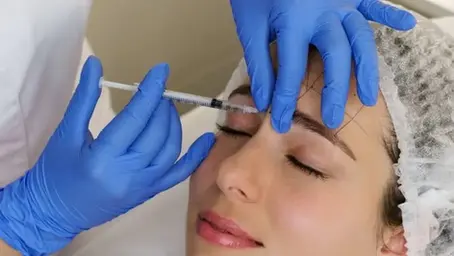 A Woman Getting Botox Injection on Face