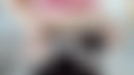 A woman measuring her belly with measuring tape