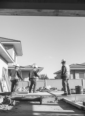 workers on residential construction site.jpg