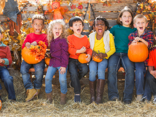 Group of children with pumpkins