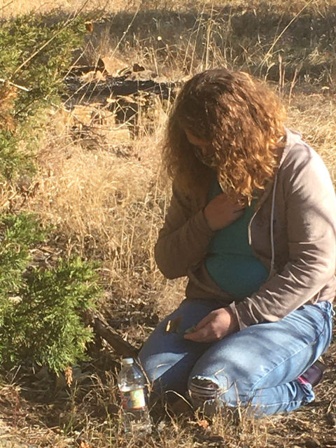 a woman has a profound moment during a nature tour