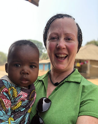 our founder and a little boy from sierra leone