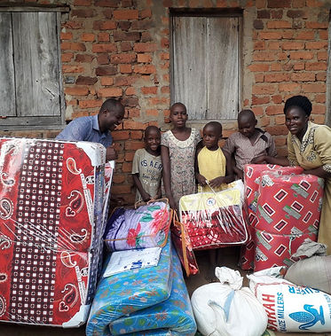 sierra leonian family with supplies that were donated by our foundation