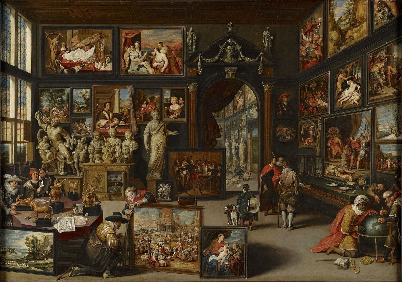 Willem van Haecht, a picture gallery with Apelles painting Campaspe (c. 1630), oil on panel, a painter at his easel among sculptures, busts and framed pictures.