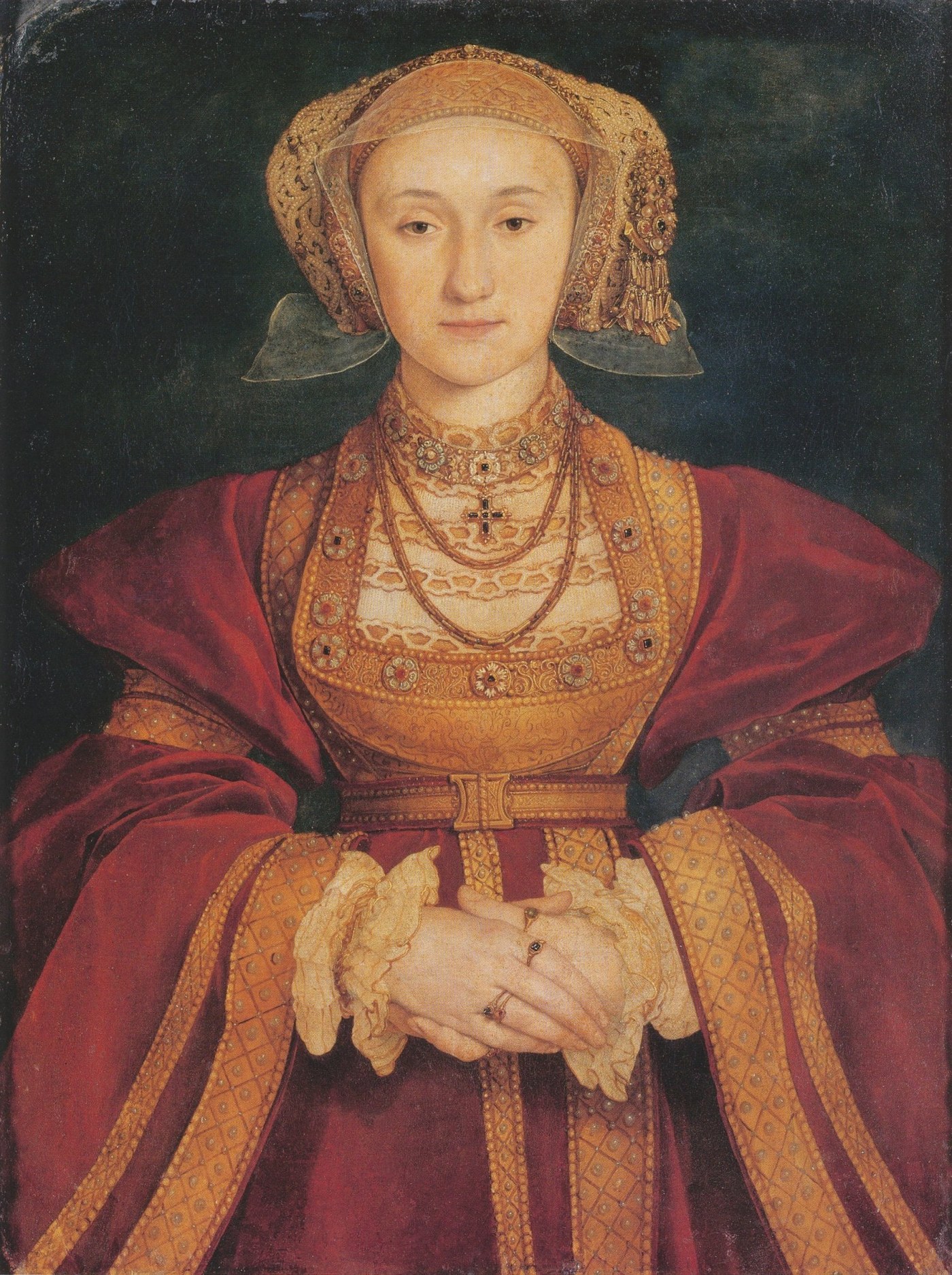 Hans Holbein the Younger, Anne of Cleves (1539), tempera and oil on parchment mounted on canvas, a young woman in a red and gold gown of the Cleves court with an elaborate jewelled headdress, hands folded before her.