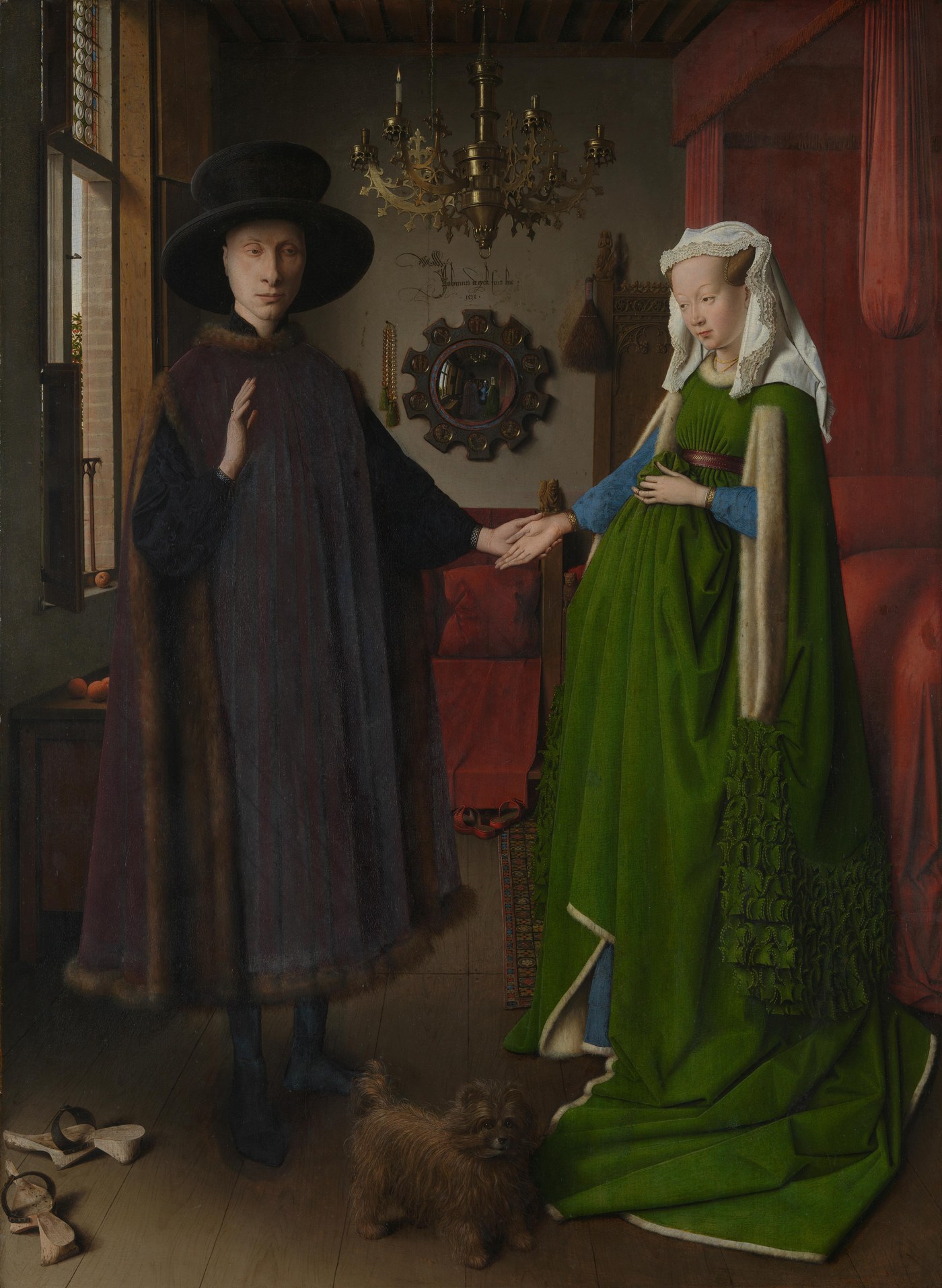 Jan van Eyck, The Arnolfini Portrait (1434), oil on oak panel, a couple standing in a furnished Bruges interior with a convex mirror on the back wall.