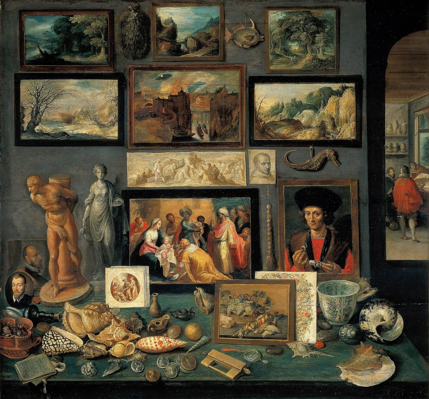 Frans Francken the Younger, Kunst- und Raritätenkammer (1636), oil on panel, a wall of small landscapes above a table of shells, coins and a portrait.