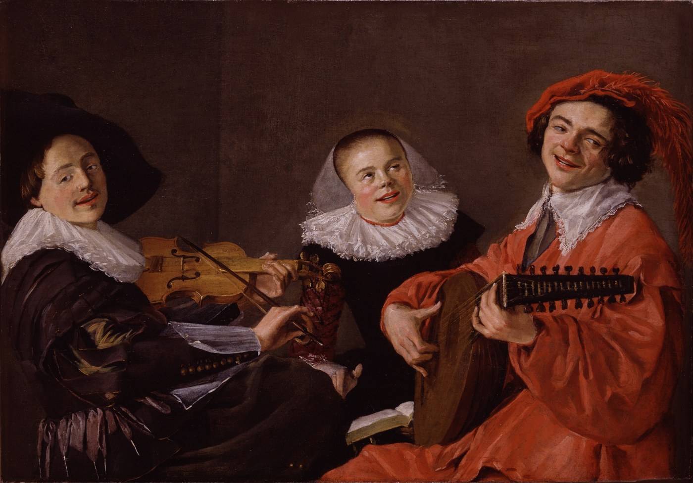 Judith Leyster, The Concert (c. 1633), oil on canvas, three figures making music together, a singer, a violinist, and a lute player, lit against a plain ground.