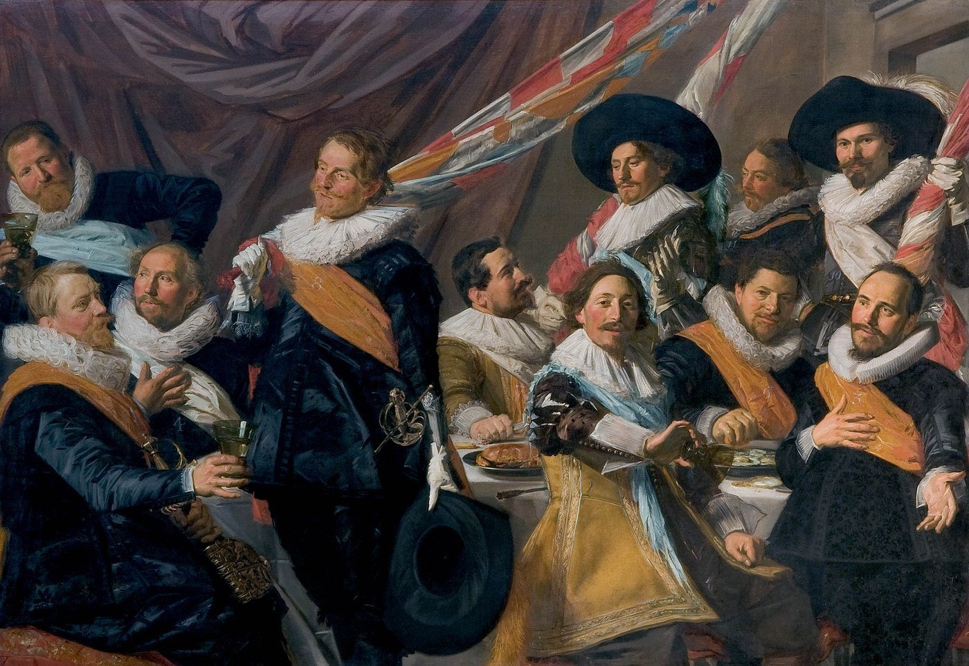 Frans Hals, The Merry Drinker (c. 1629), oil on canvas, a smiling man in a broad hat raising a glass, painted with the fast open brushwork often confused with Judith Leyster's.