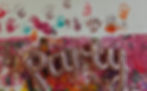 Close-up view of colorful painted feet on paper for sensory play