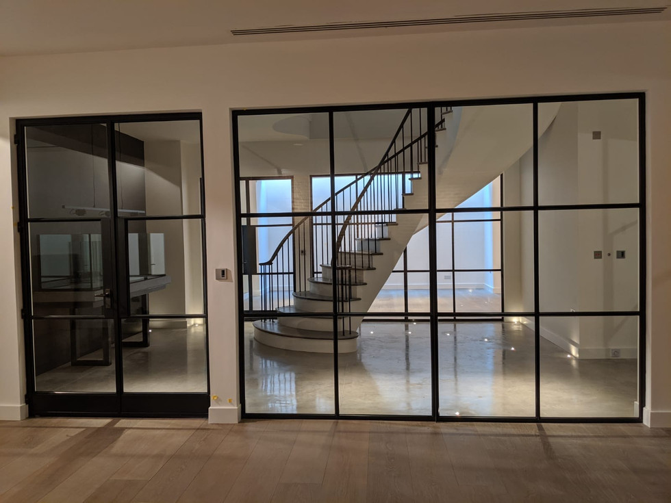 Image of a curved stairs in Wimbledon high end property