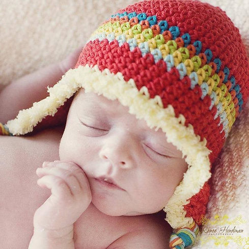retro red rainbow flap hat.jpeg