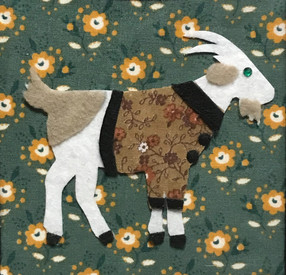White Goat with Flower Coat